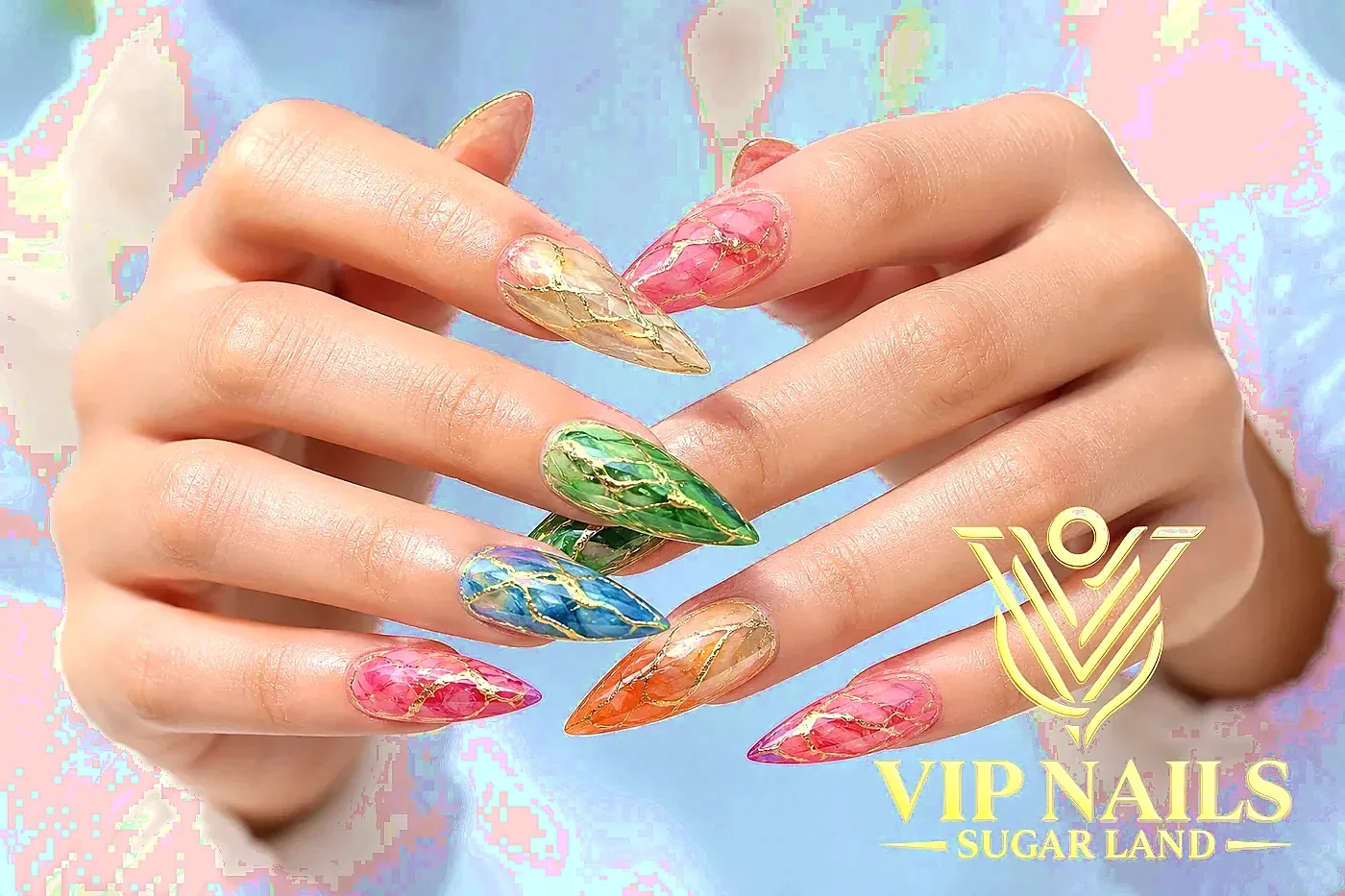 XL colorful marble stiletto nails with gold chrome veins