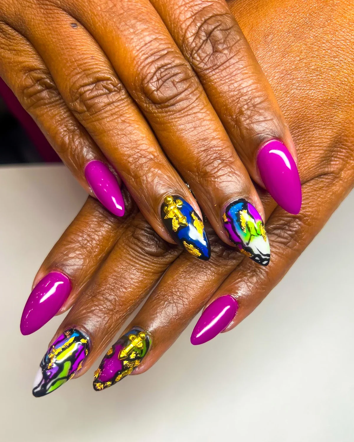 Magenta almond set with fluid-art accent nails by VIP Nails Sugar Land