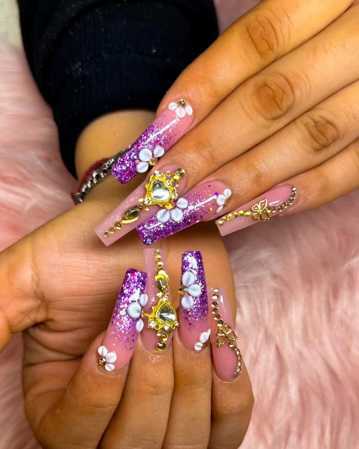 Purple glitter set with gold charms and crystals by VIP Nails Sugar Land