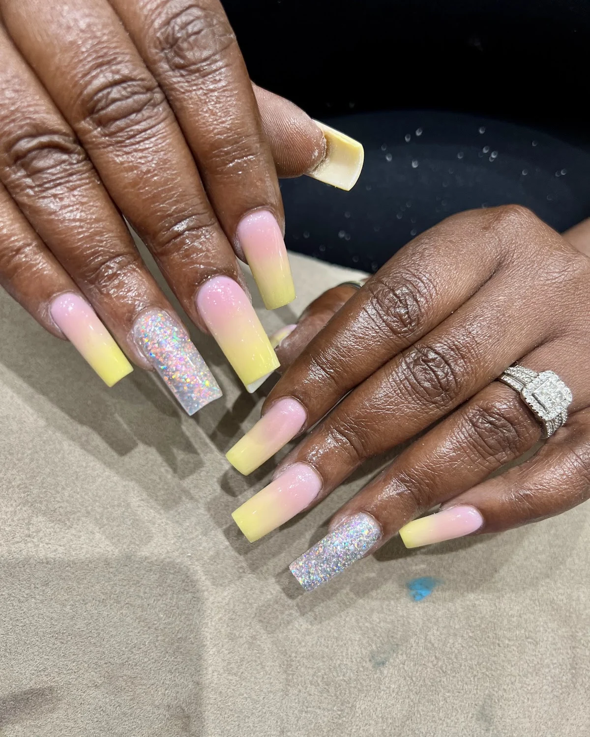 Yellow-to-pink ombré coffin set with glitter accents by VIP Nails Sugar Land